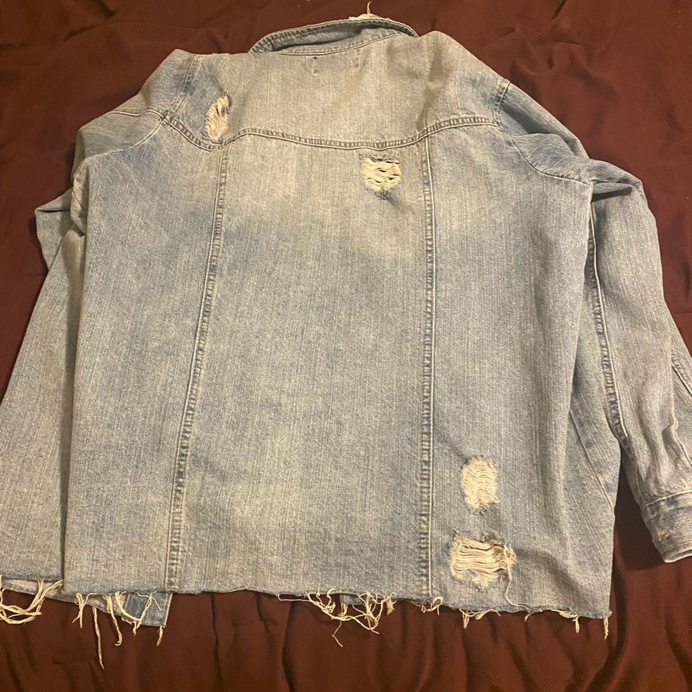 Cute blue Jean coat , has rips in the arms, back and front. - Picture 3 of 3